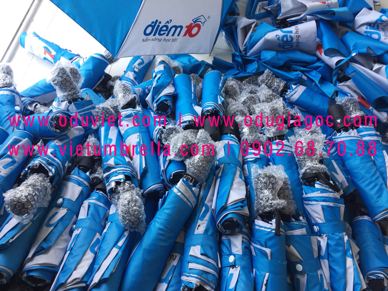 xưởng sản xuất ô dù cầm tay in logo quảng cáo